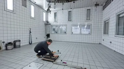 Robert Rett lights a fire in the fire laboratory of Bosch Sicherheitssysteme GmbH