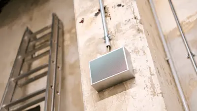 Good to listen: one of more than 100 loudspeakers of the voice alarm system.